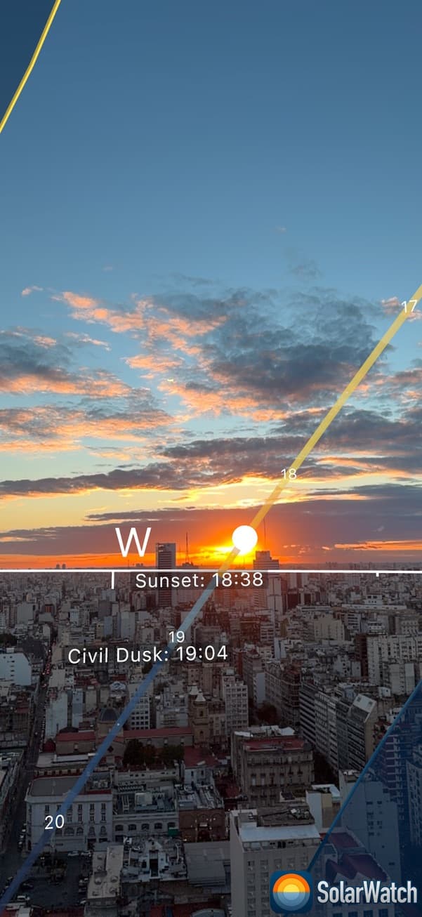 SolarWatch AR mode showing the Sun path over a city skyline